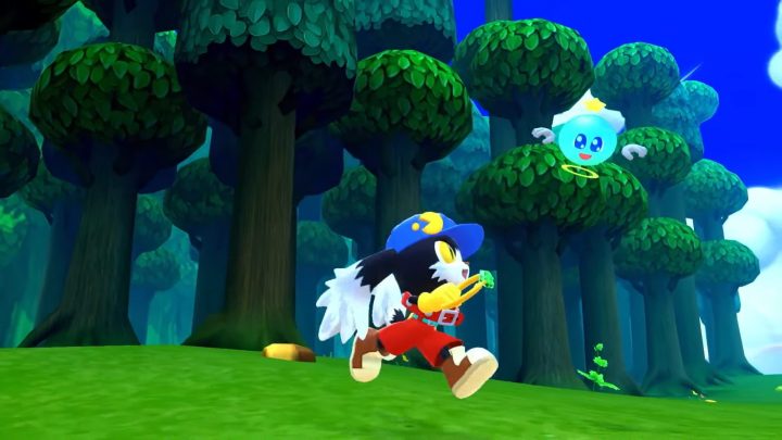 Capture d'écran de Klonoa Phantasy Reverie Series avec Klonoa courant aux côtés de Huepow devant une forêt.
