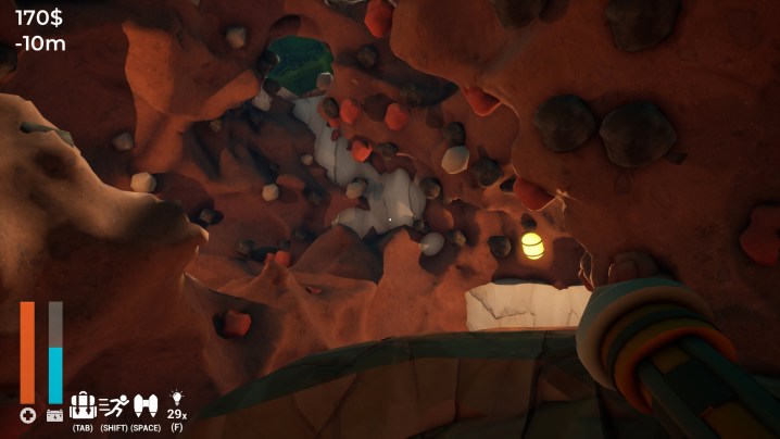 Un personnage regarde des roches dans A Game About Digging a Hole.