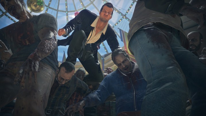 Frank West sautant par-dessus des zombies dans Dead Rising Deluxe Remaster.