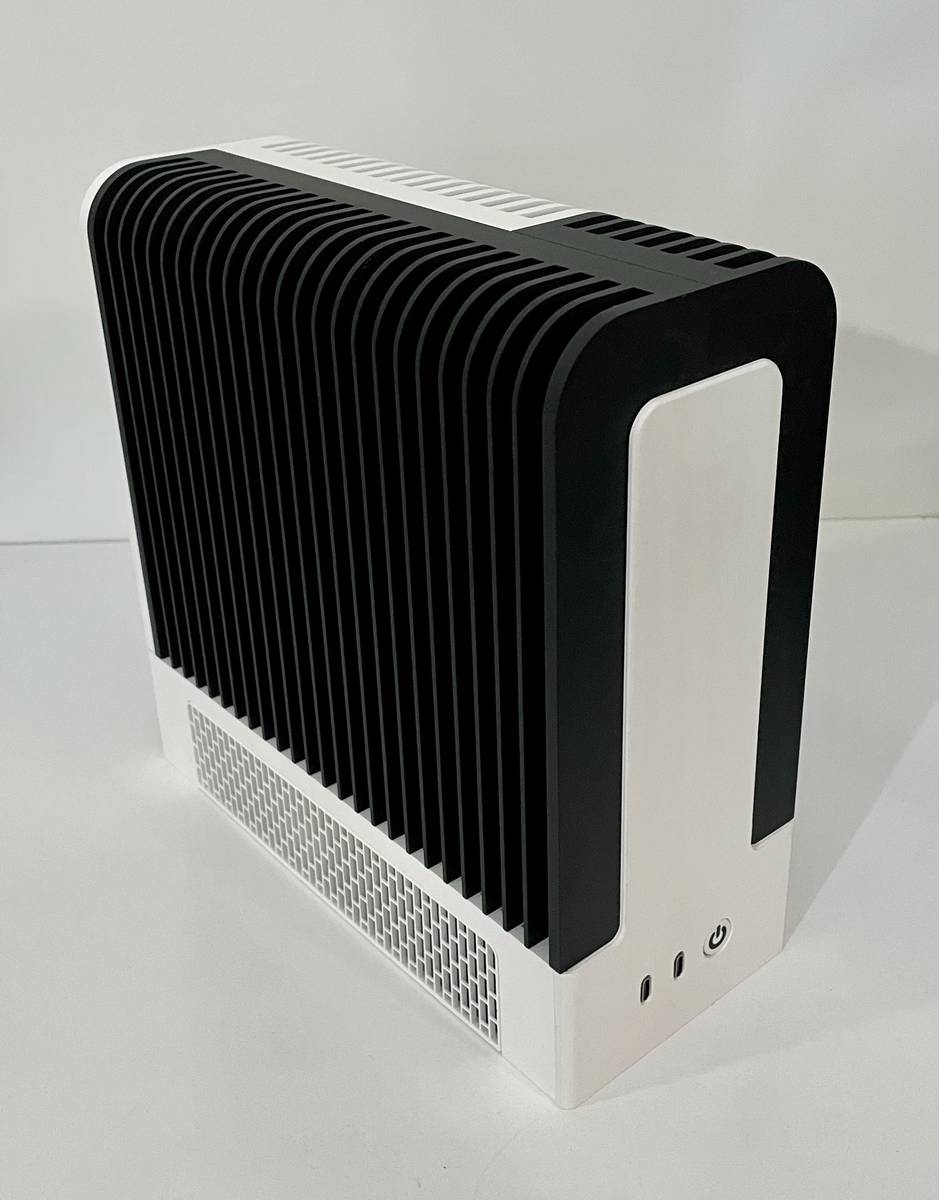 Monochrome 2 custom fanless 7.5L Strix Halo machine.