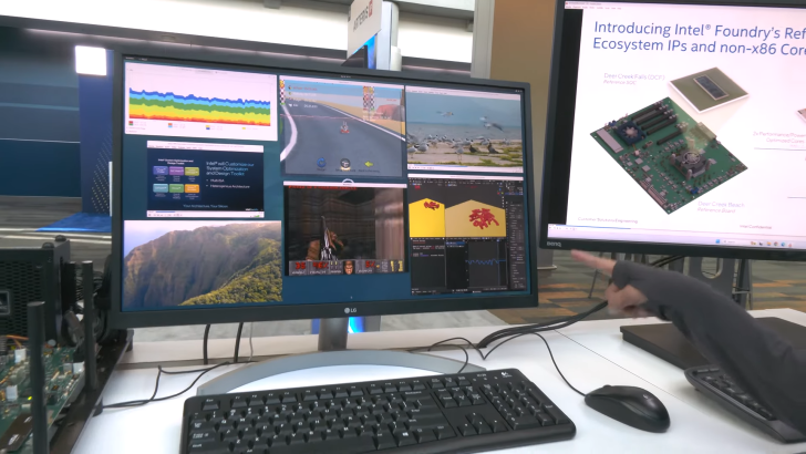 Deux écrans affichant graphiques, logiciels et jeux dans une configuration d'exposition technologique.