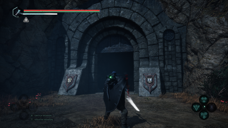 Un personnage avec une épée lumineuse devant une entrée de donjon.