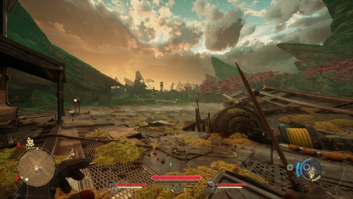 Un personnage dans un paysage post-apocalyptique au coucher du soleil.