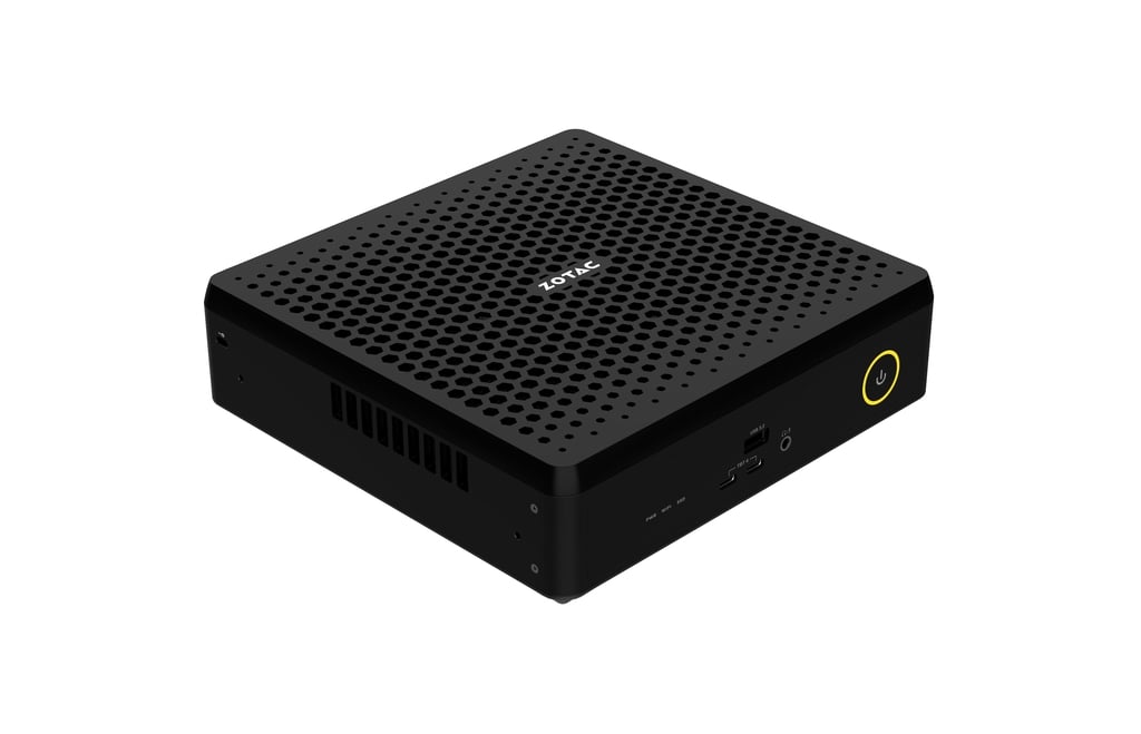 ZOTAC mini PC with a power button and vented design.