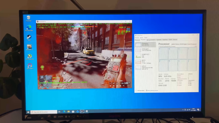 Moniteur AOC affichant des statistiques de performance avec la carte graphique AMD Radeon RX 5700 sur un processeur AMD FX-9590.