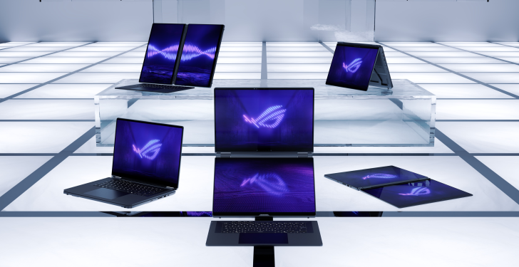 Gamme d'ordinateurs portables ASUS ROG dans une pièce futuriste.