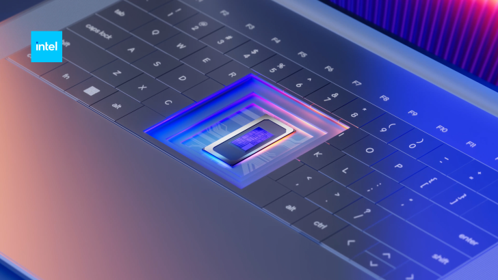 Logo Intel au-dessus d'un clavier avec une puce de processeur éclairée.