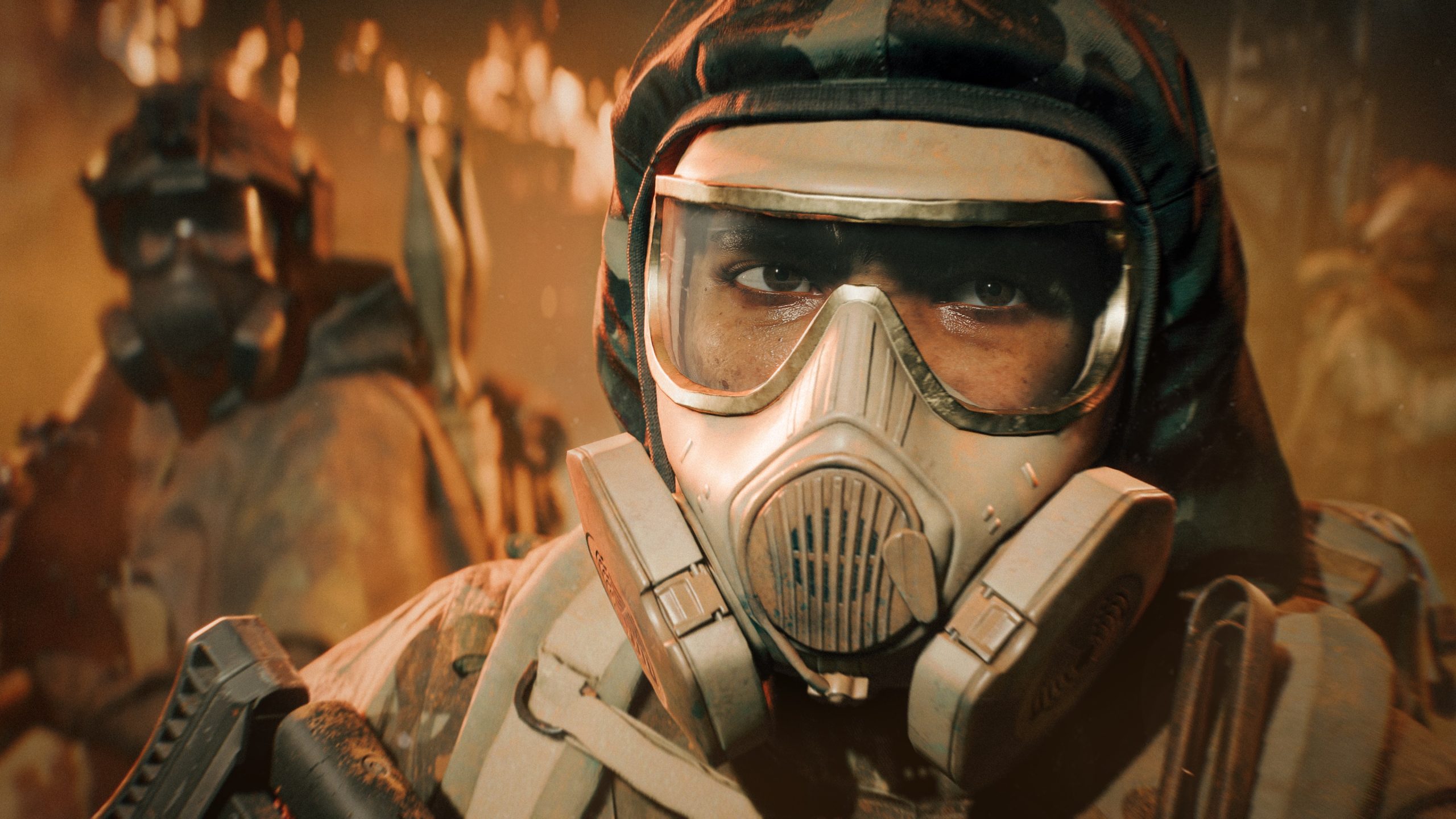 Un soldat dans Battlefield 6 portant un masque à gaz dans un environnement sombre.