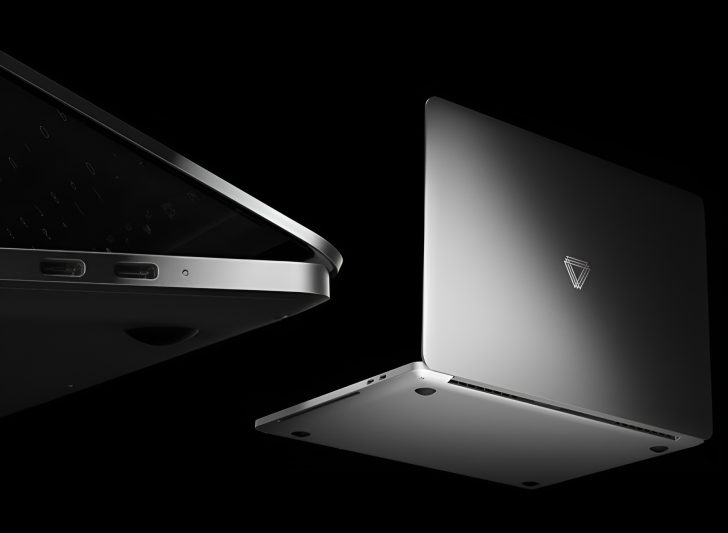 Deux ordinateurs portables UNICORN en argent avec un logo triangulaire