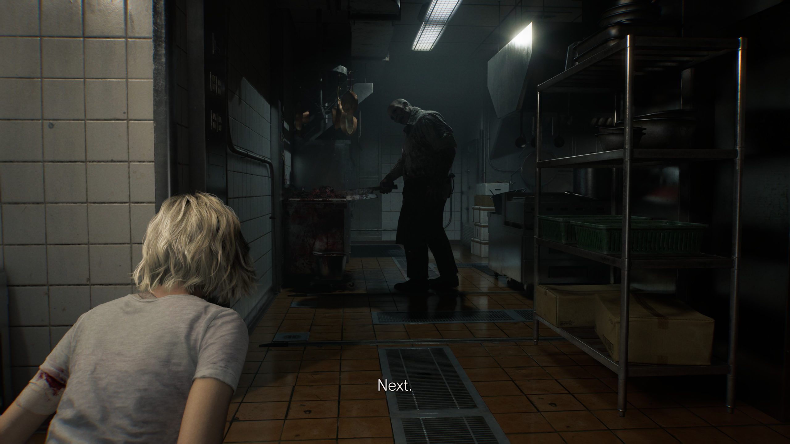 A character in a dimly lit kitchen scene from Resident Evil Requiem is crouching while observing an intimidating figure wielding a