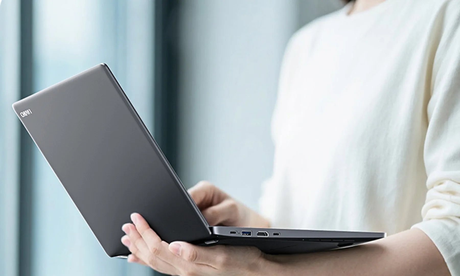 CHUWI CoreBook X Laptop in hand