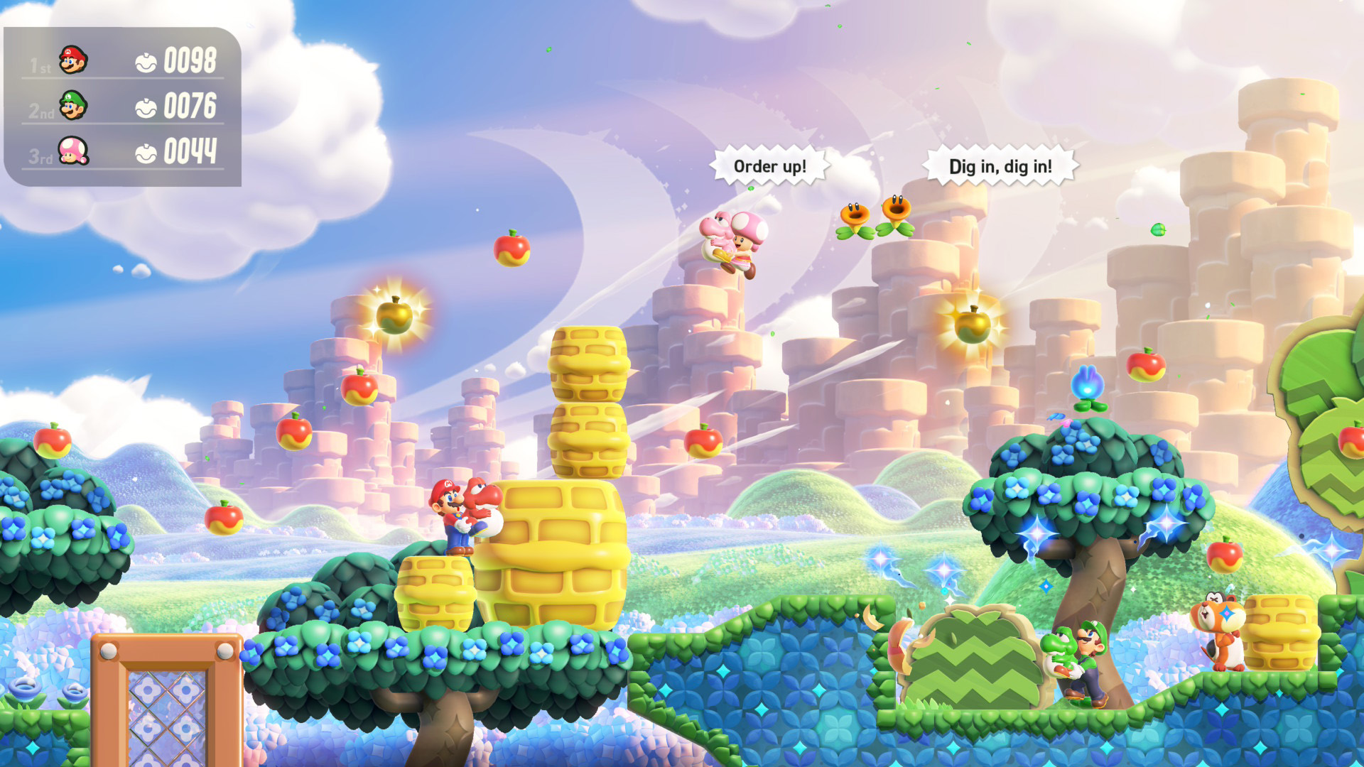 Personnages d'un jeu Mario collectant des pommes dans un paysage coloré