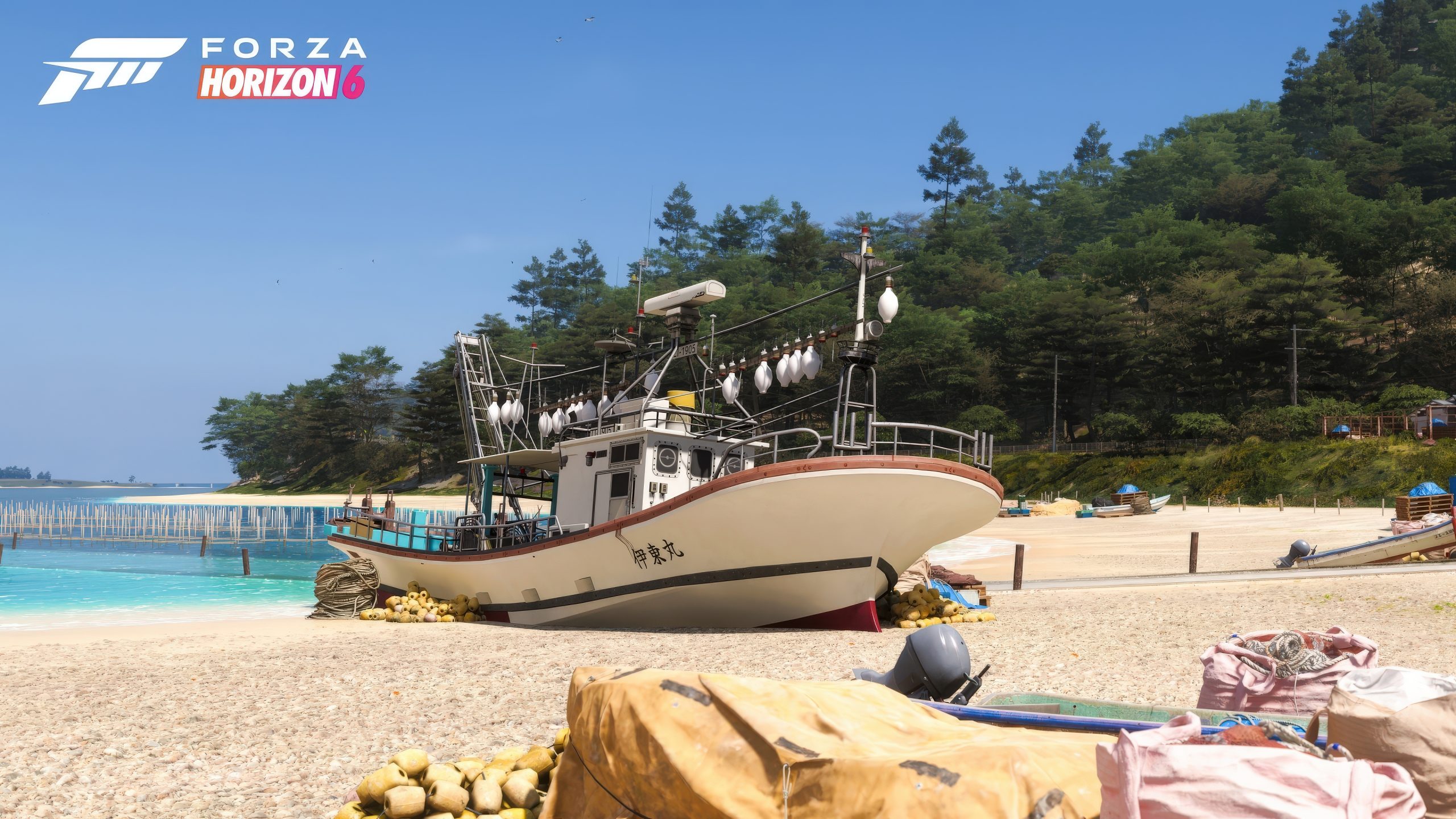 A boat on a sandy beach with a forest in the background shows in-game scenery from 'Forza Horizon 6.'