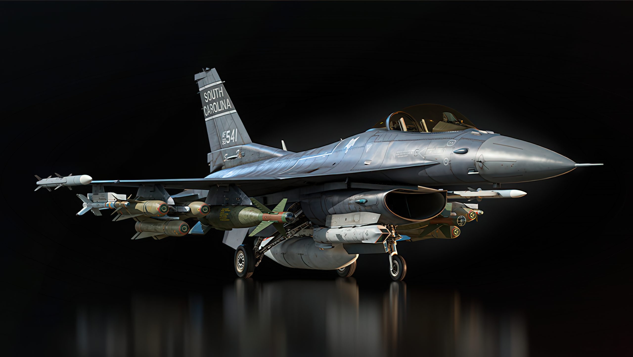 A U.S. Air Force F-16 jet with SOUTH CAROLINA and AF 85 541 markings on the tail, equipped with missiles and bombs.