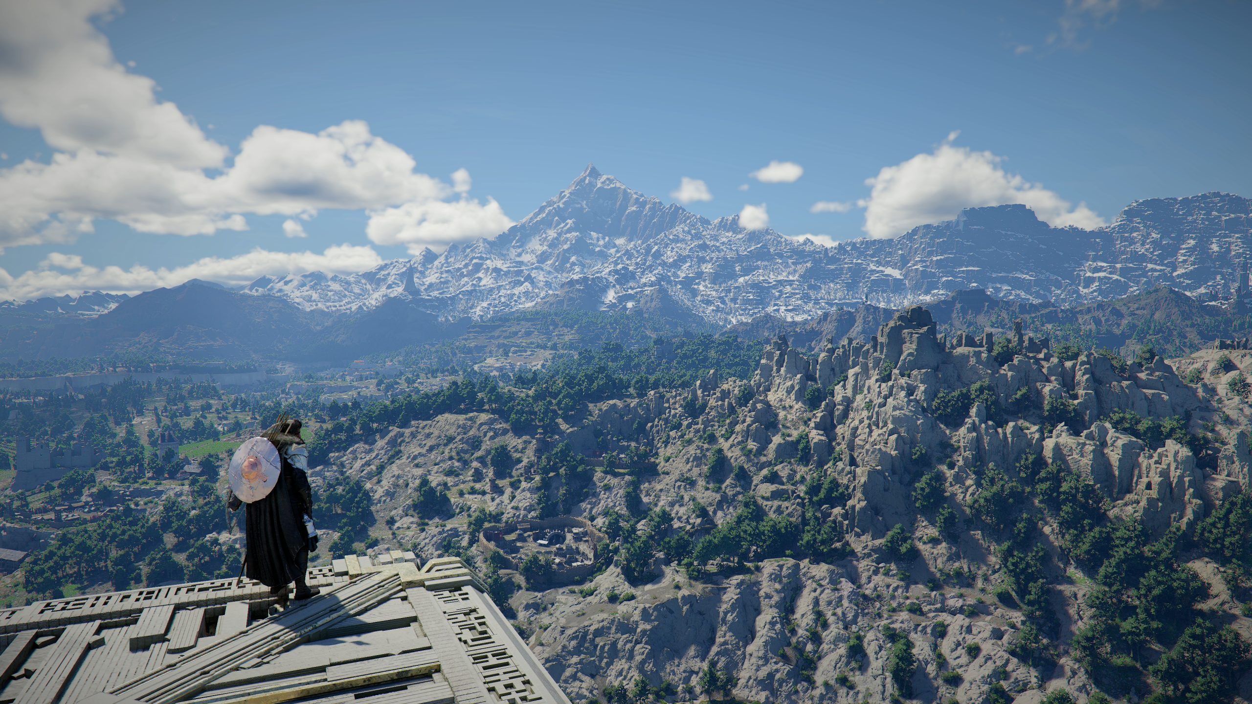 A character in Crimson Desert stands on a rooftop overlooking a vast, mountainous landscape.