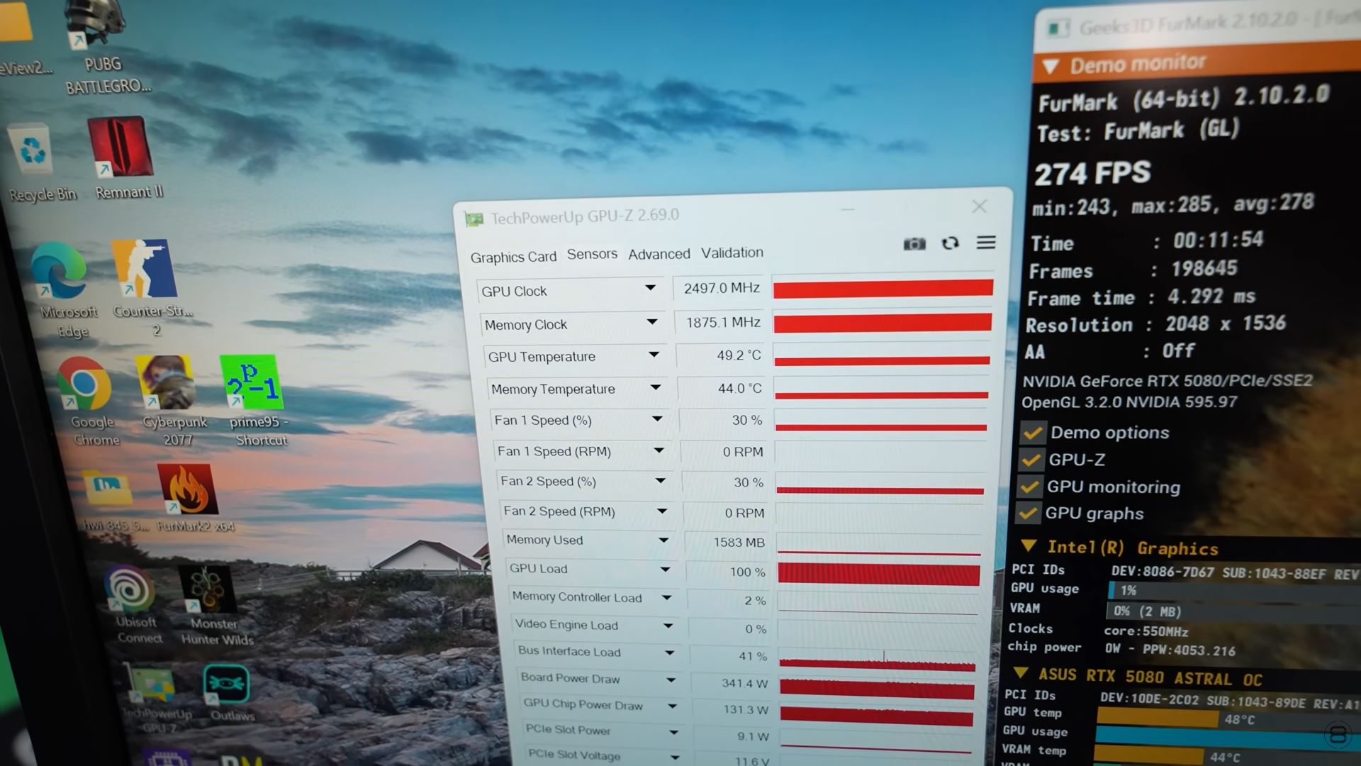 Écran GPU-Z 2.69.0 affichant un GPU à 2497,0 MHz et une mémoire à 1875,1 MHz pour la GeForce RTX 5080, avec FurMark à 2048 x 1536.