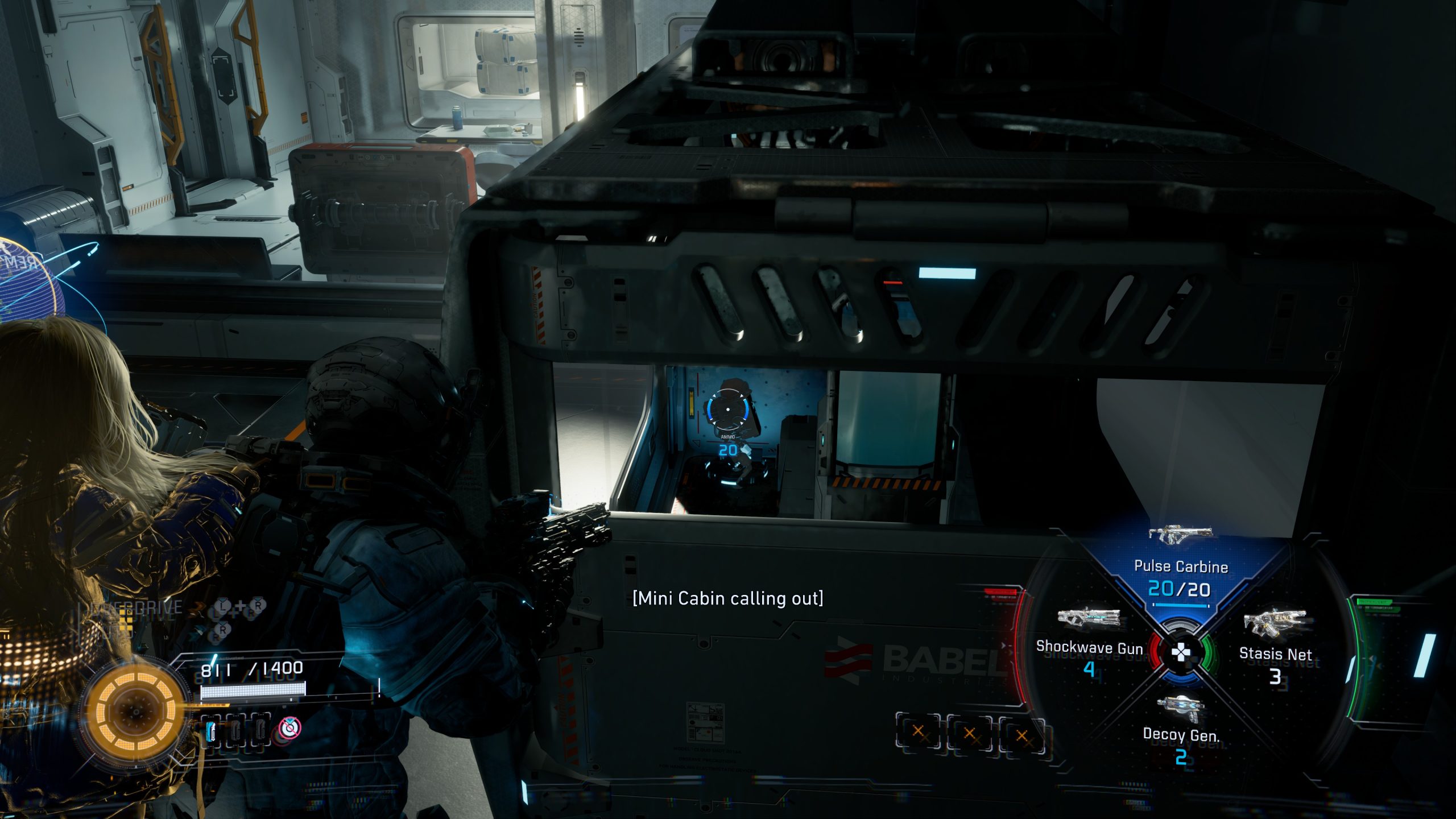 Two characters in PRAGMATA aim a weapon in a space station corridor with the HUD displaying 'Pulse Carbine 20/20' and text reading '[Mini Cabin calling out]'.