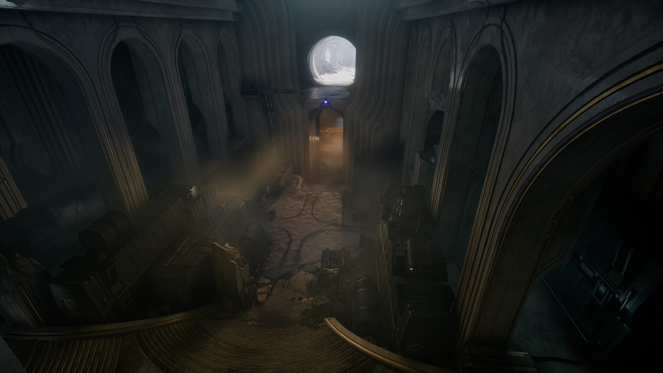 A dimly lit, abandoned hallway from a video game with arched architecture and scattered debris, showing light streaming in from a circular window.