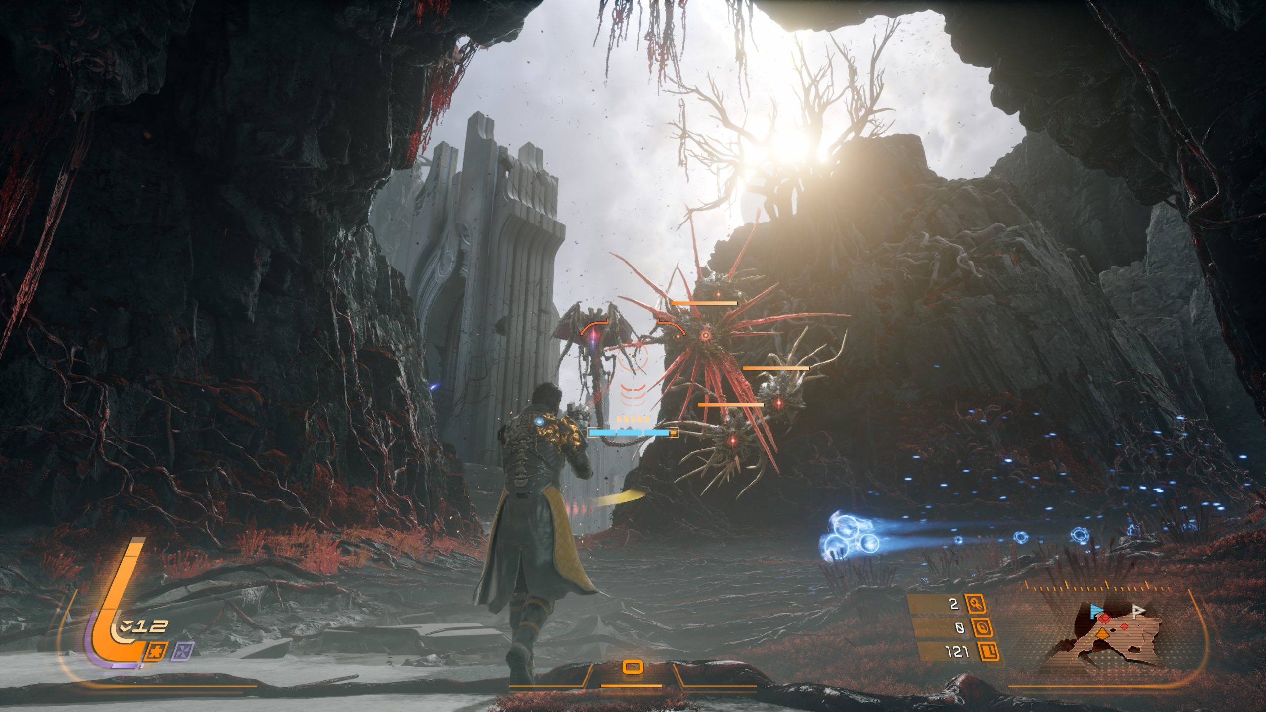 A character in Saros confronts a large winged creature in a rocky, overgrown landscape with on-screen HUD elements showing 'Level 12' and a mini-map.
