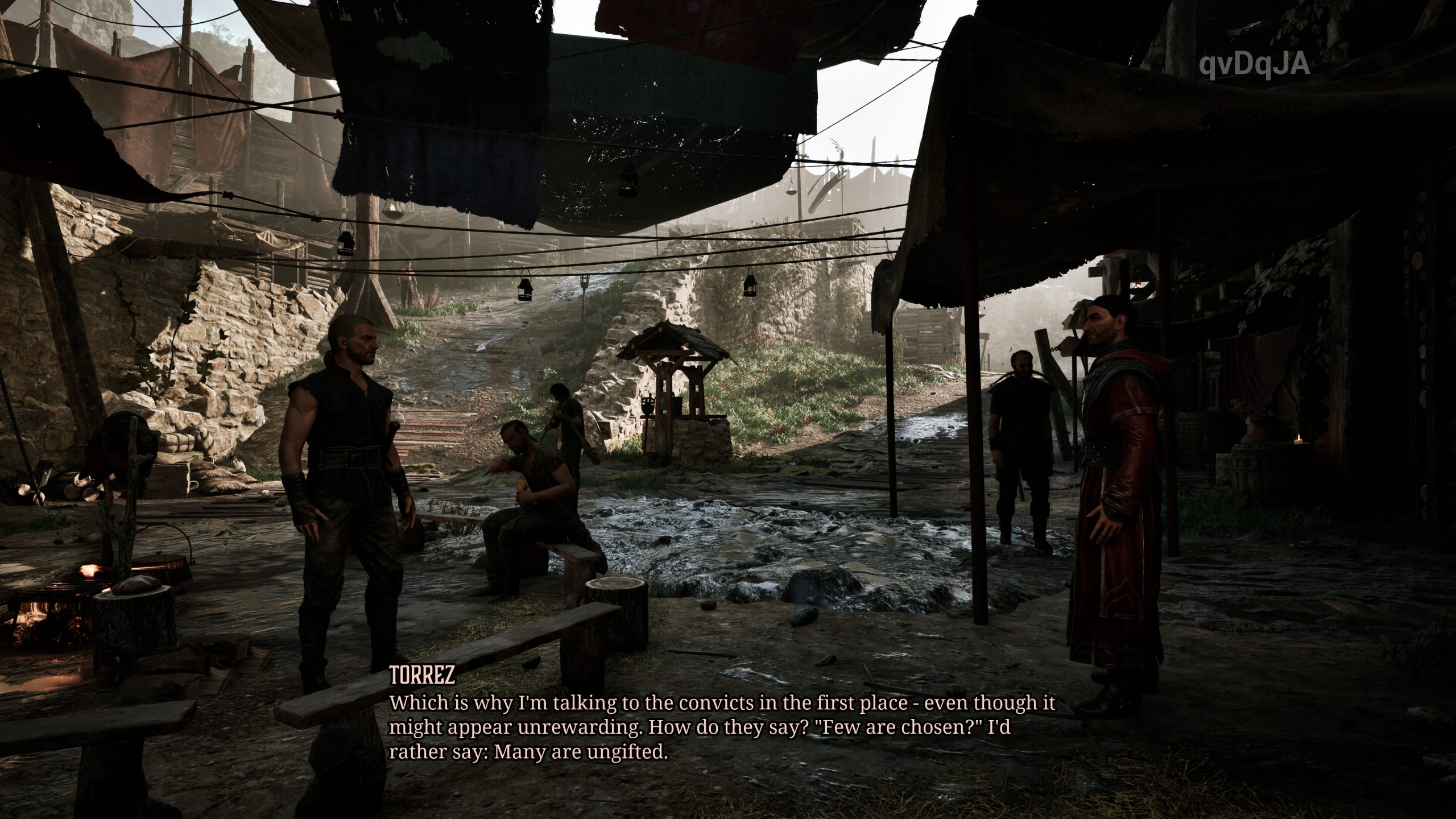 A scene in a medieval setting from the game 'Gothic 1 Remake,' featuring multiple characters in conversation with the text: TORREZ: Which is why I'm talking to the convicts in the first place - even though it might appear unrewarding. How do they say? 'Few are chosen?' I'd rather say: Many are ungifted.