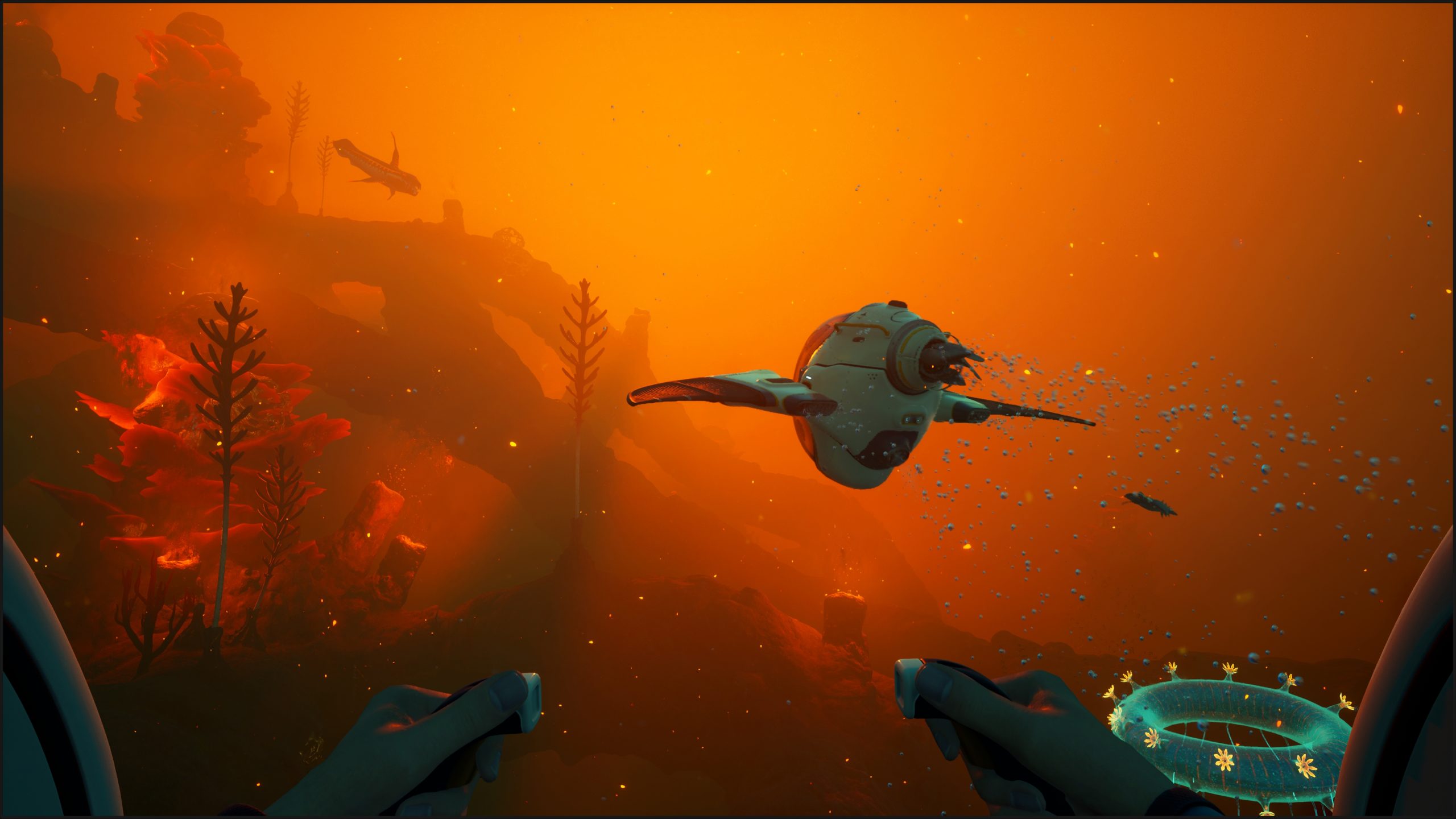 A scene from the game 'Subnautica: Below Zero' shows a player piloting a submersible through an underwater landscape with glowing plants and marine creatures.