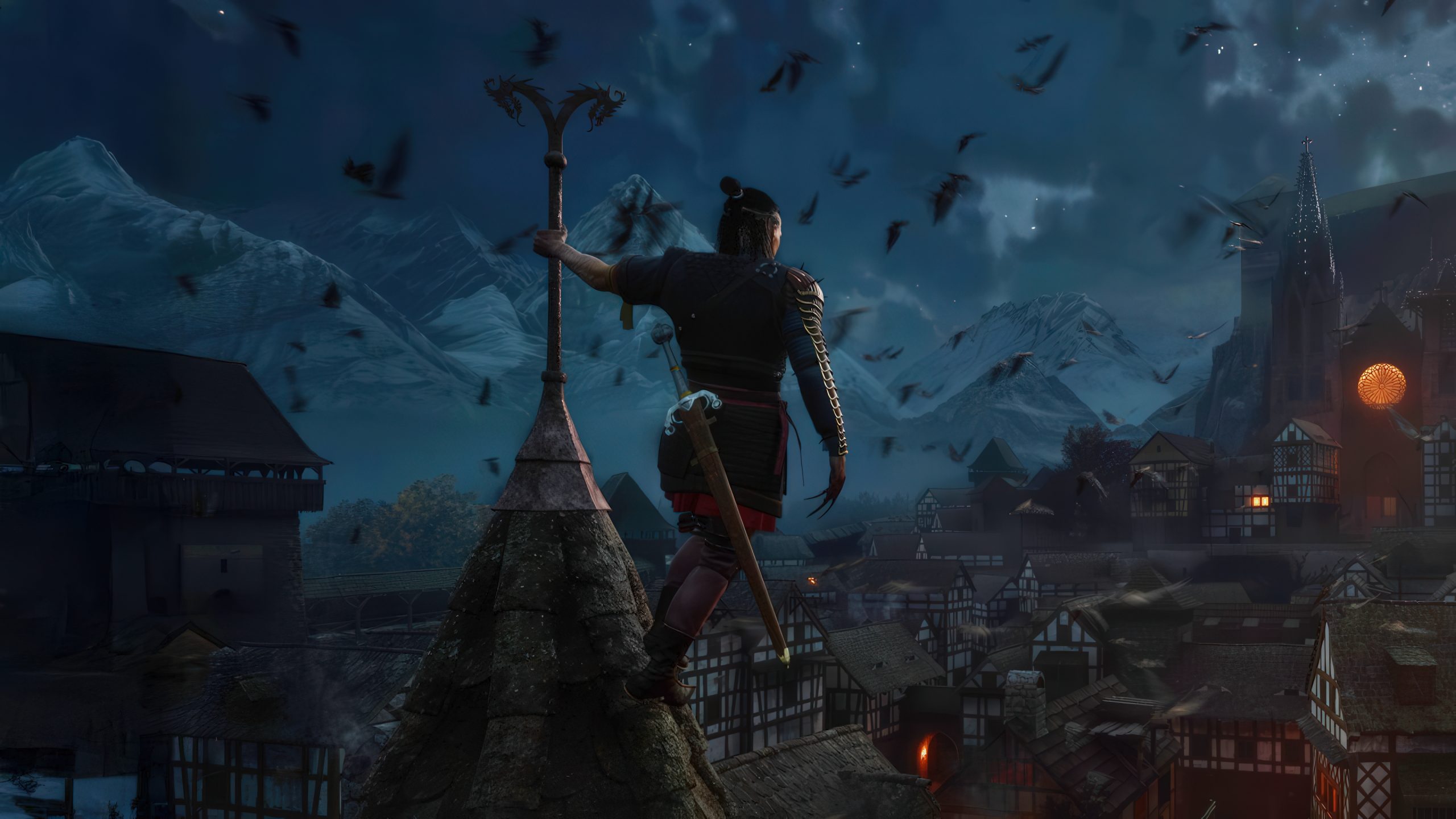 A character in ornate armor stands atop a building, holding a sword and facing a night sky filled with mountains, birds, and medieval houses from a scene in a video game.