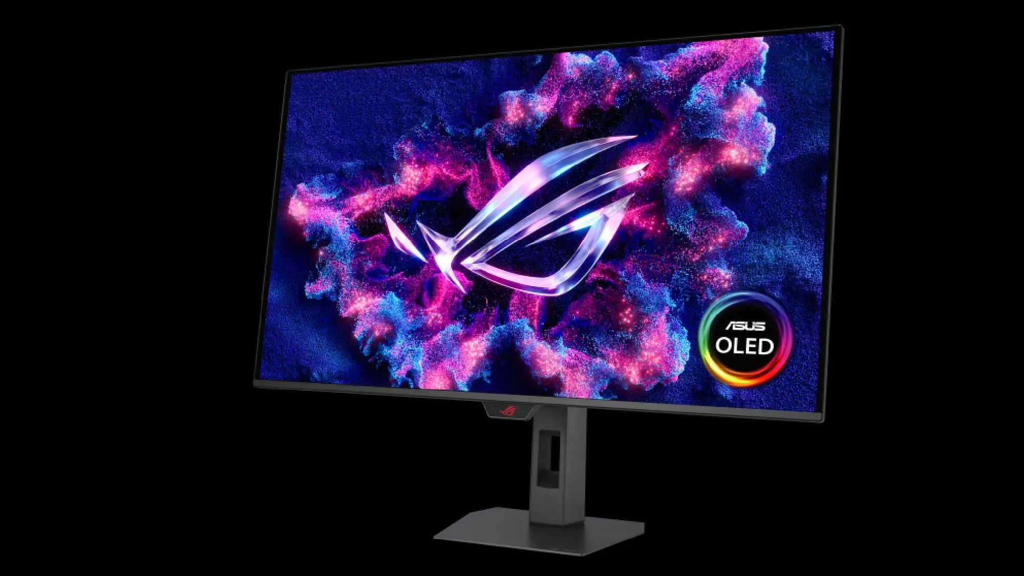 Un moniteur ASUS OLED affichant le logo ROG sur un fond cosmique et coloré.