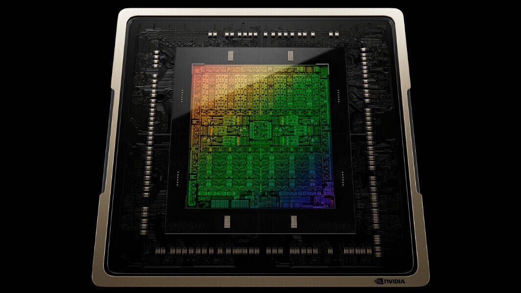Gros plan sur une puce semi-conductrice NVIDIA avec un motif de gradient arc-en-ciel.