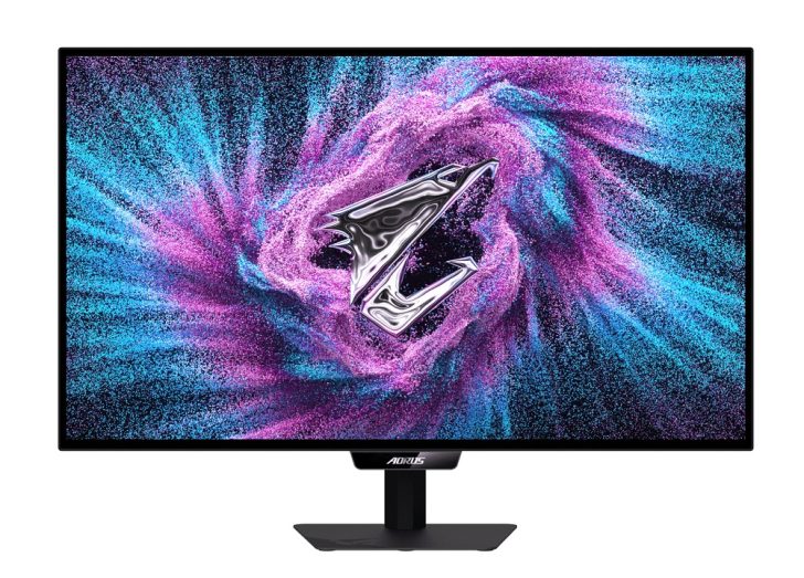 Un moniteur AORUS de Gigabyte affiche un motif vibrant de tourbillons violets et bleus avec un logo Z métallique au centre.