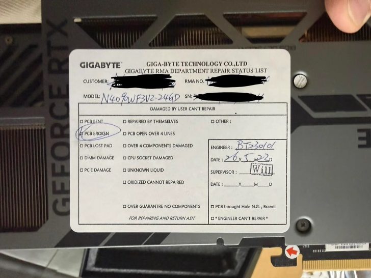 Une carte graphique Gigabyte avec un bordereau de réparation marqué 'PCB BROKEN' pour le modèle N4090WF3V2-24GD.