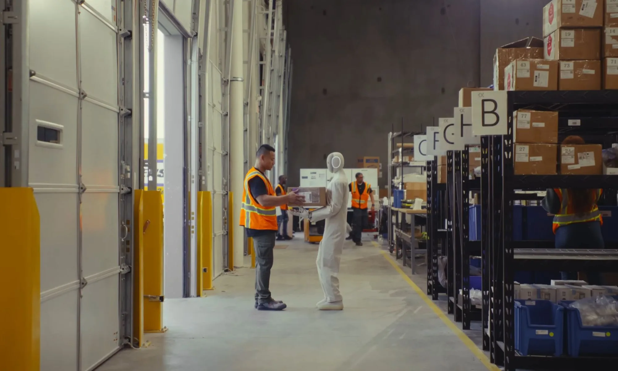 1X Neo robot helping on the factory floor.
