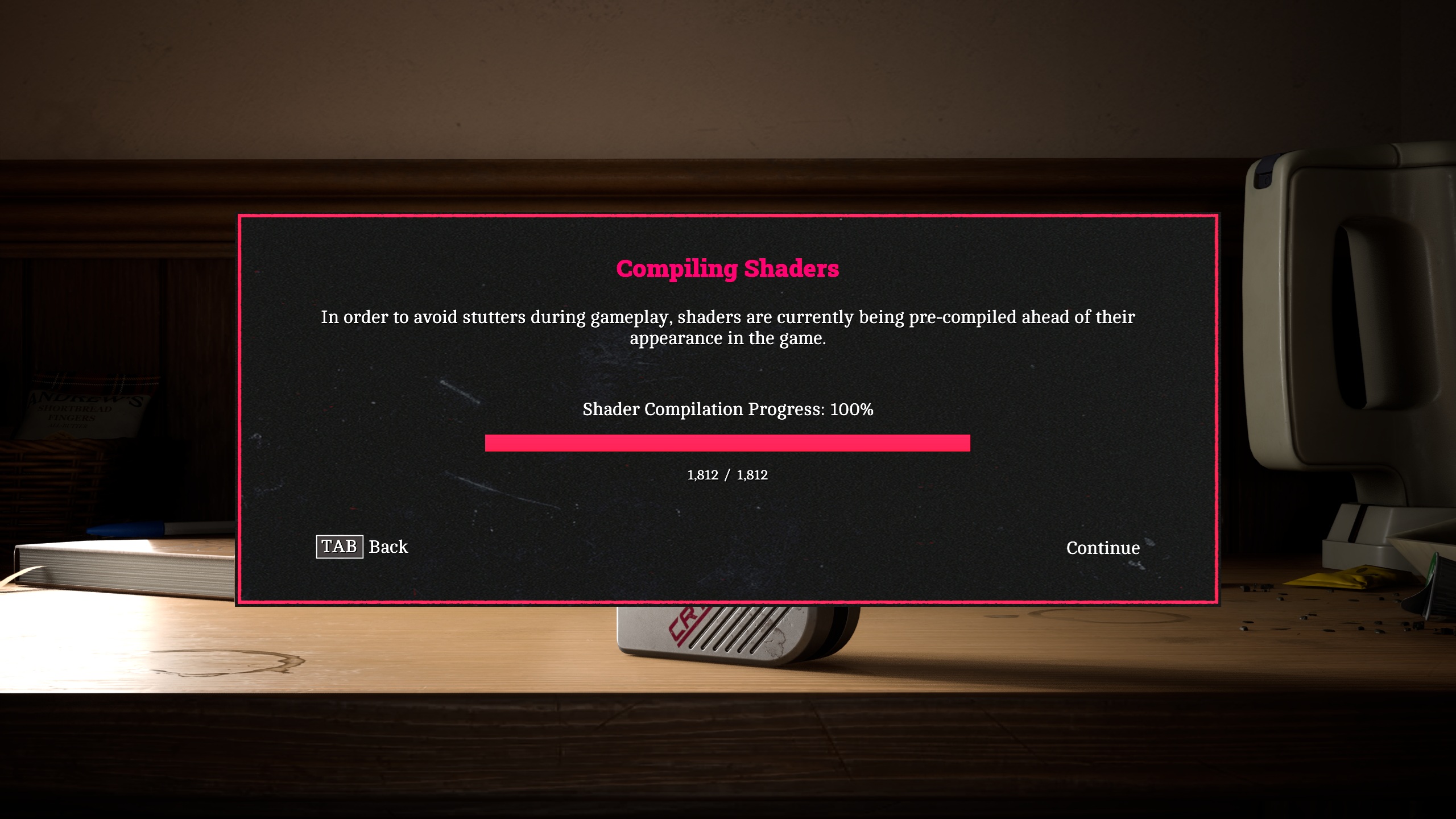 Un écran affiche une notification 'Compilation des shaders' avec une barre de progression à 100%.