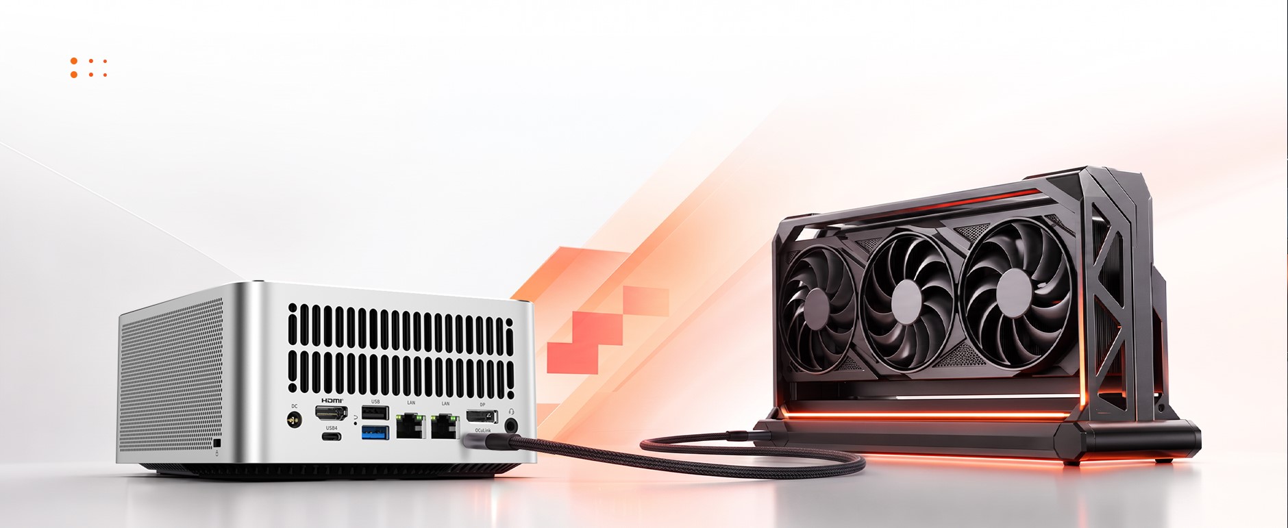 A white device with ports labeled 'HDMI' and 'USB4' is connected via a cable to a large, three-fan cooling unit with red accents.