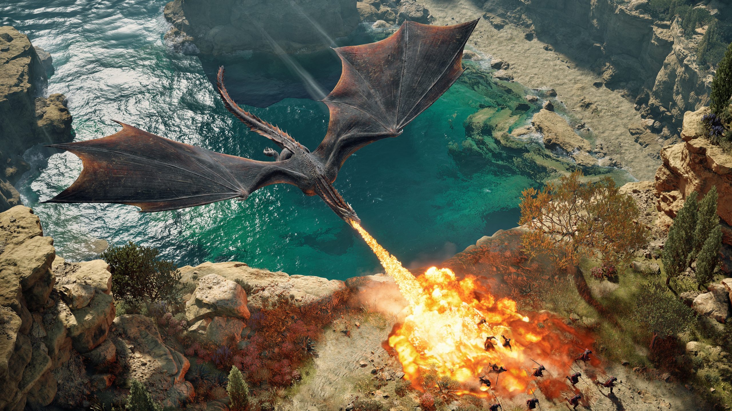 Un dragon crache du feu sur un groupe de soldats près d'une falaise dans le jeu Game of Thrones: War for Westeros.