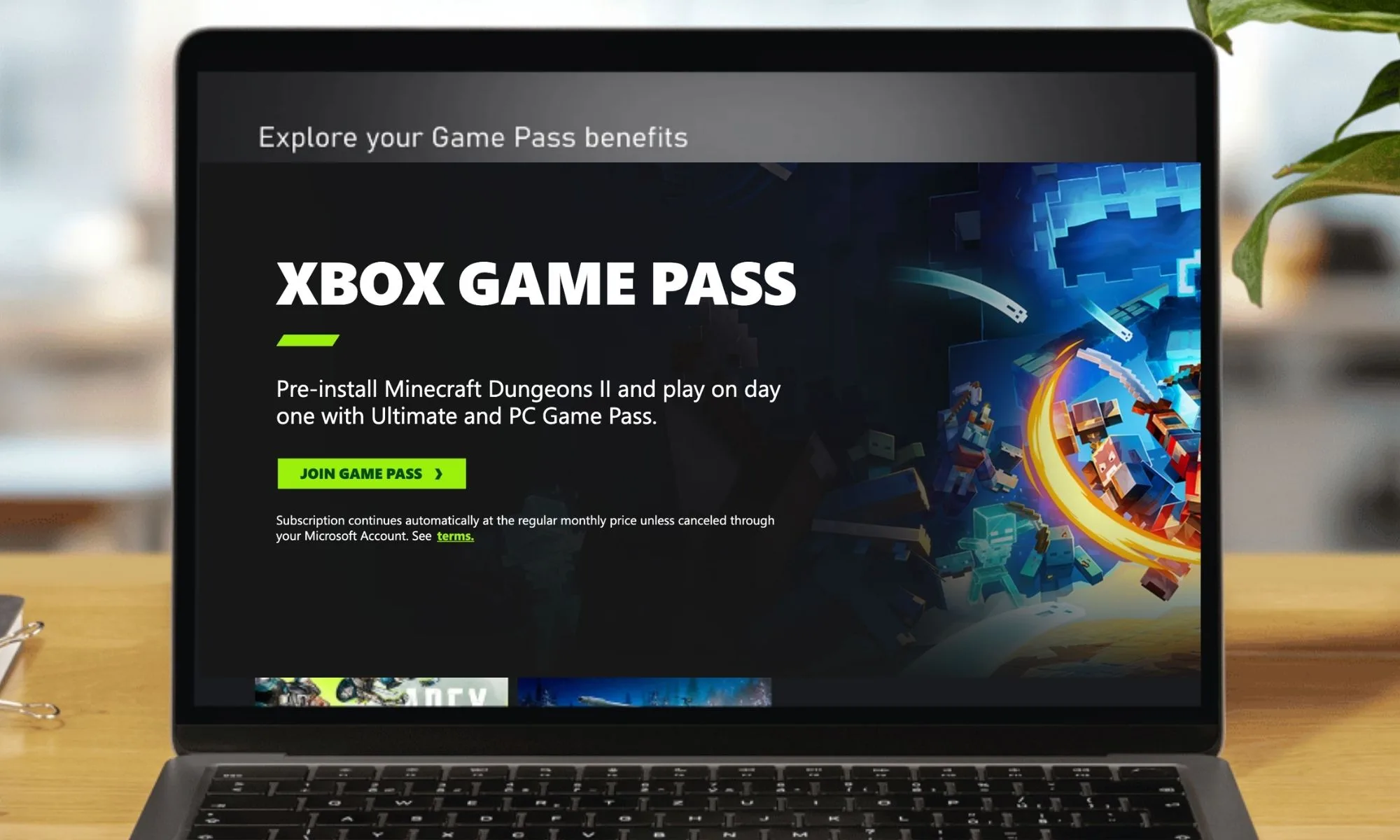 Xbox Game Pass depicted on a laptop.
